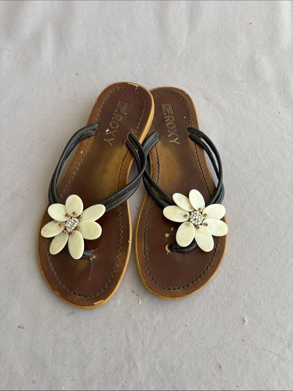 Roxy Brown Sandal with Black Straps and White Flower